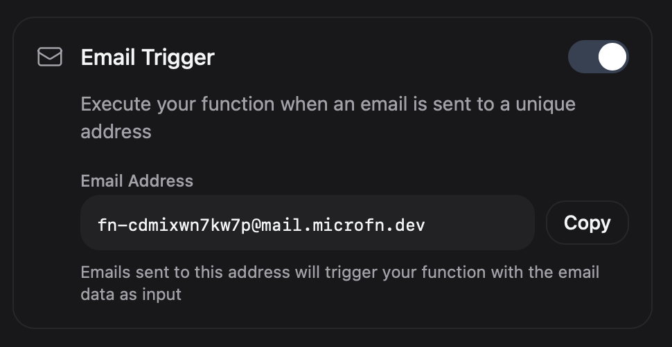 Email trigger UI showing the enable toggle and unique Microfn email address